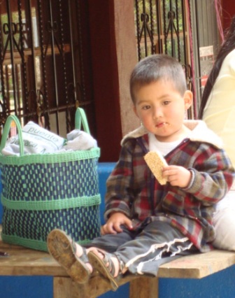 boy eating amaranth.JPG